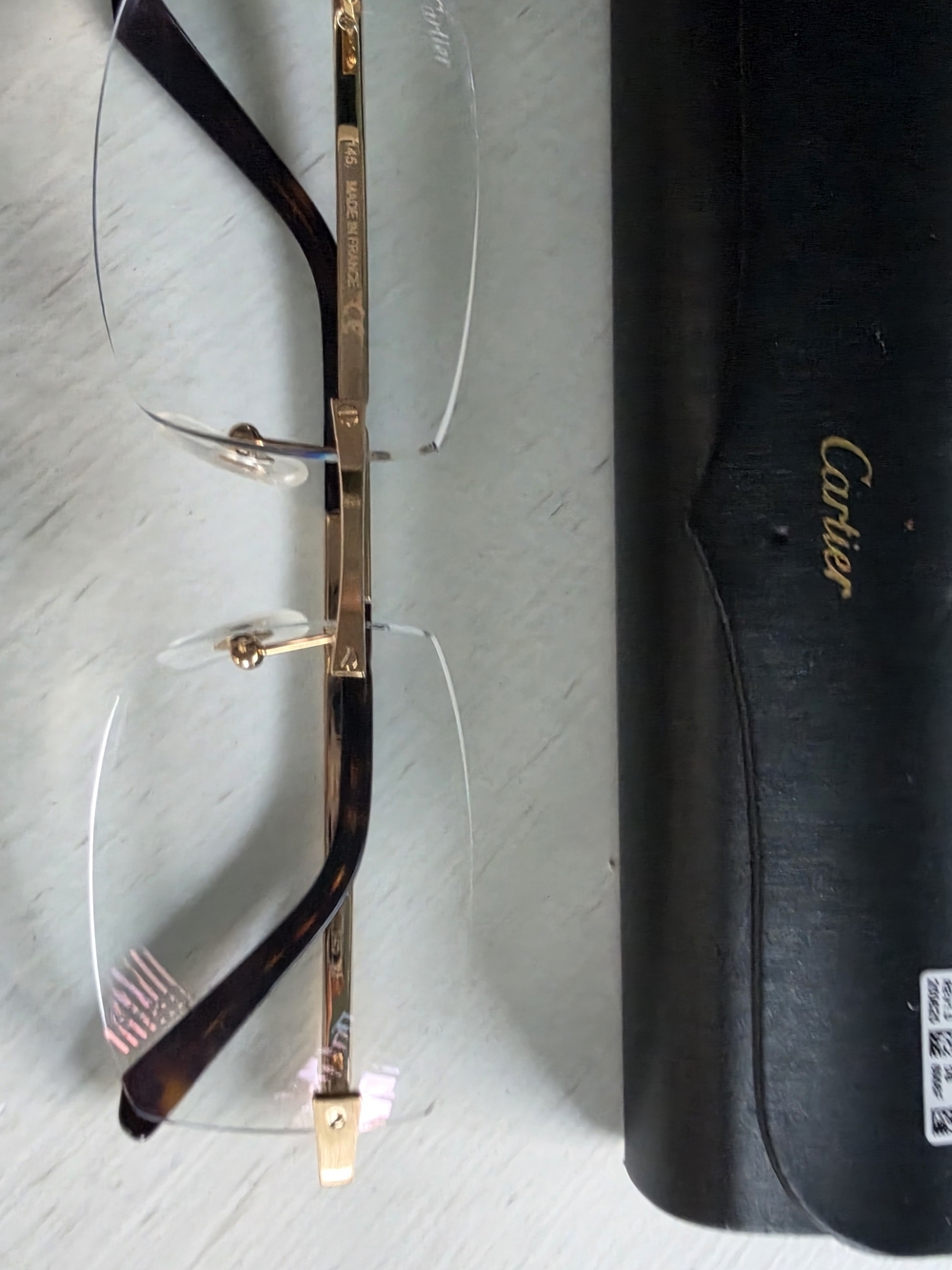 Cartier Men's Rimless Sunglasses - Gold Frame, Black Lenses
